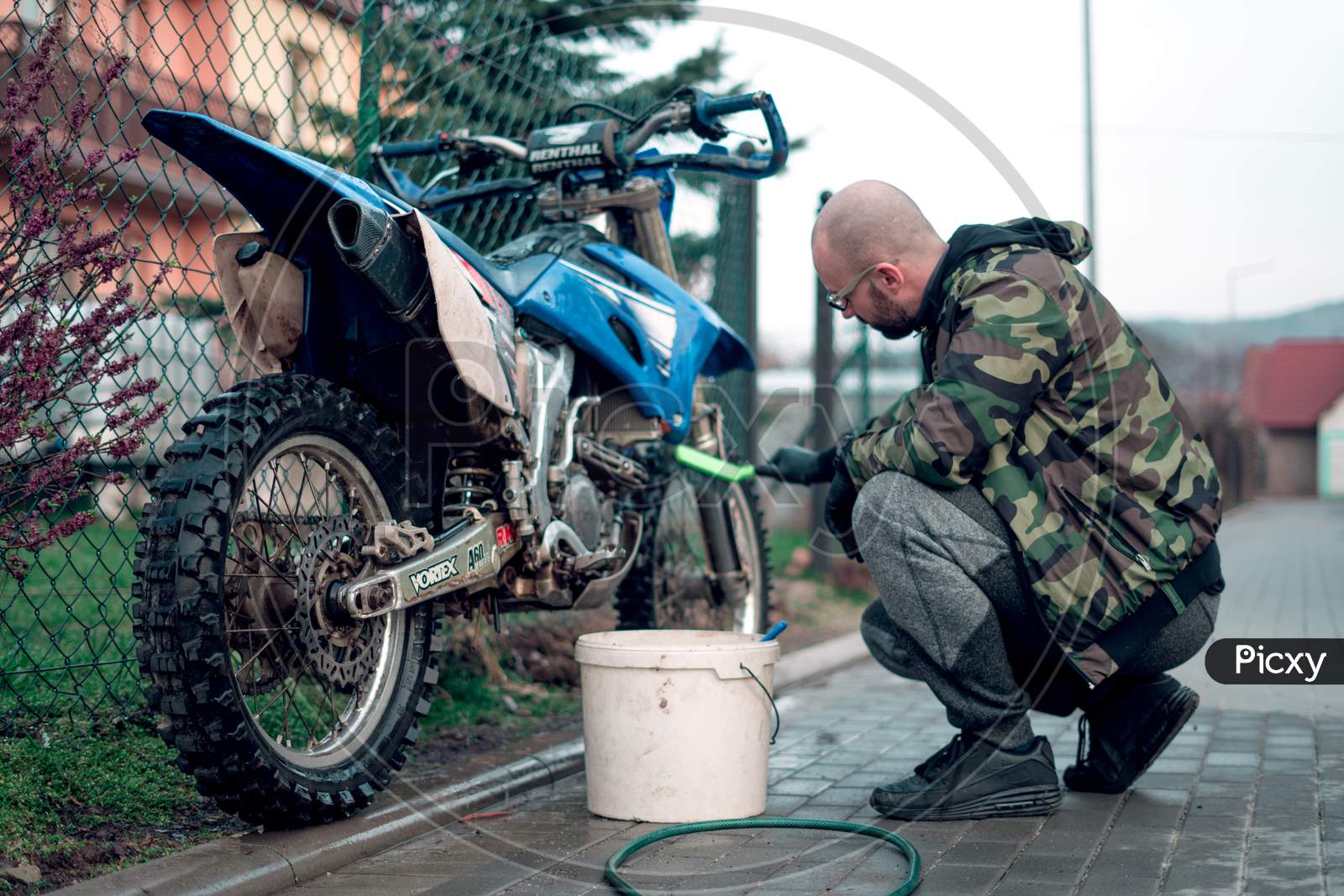 27 March 2020 Wroclaw - Motocross Yamaha WR 250r has been washed by young man.