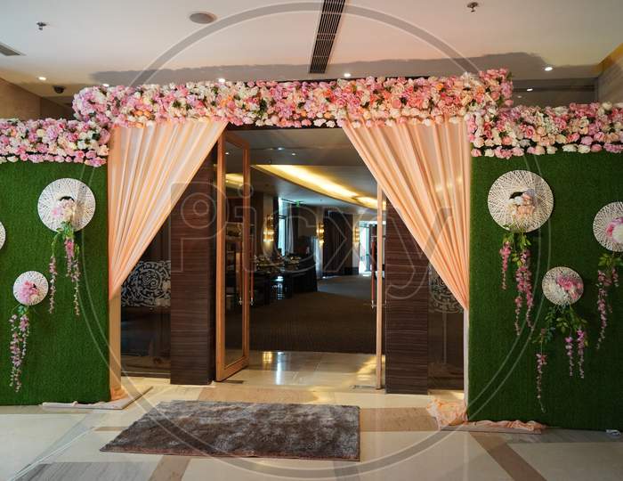 Floral Wedding Decoration Element. Lights, Entrance Gate, Shower, Flowers, Couple Stage. Closeup Beautiful Flowers Wedding Arch At The Entrance Of The Banquet Hall - Chandigarh India December 2019