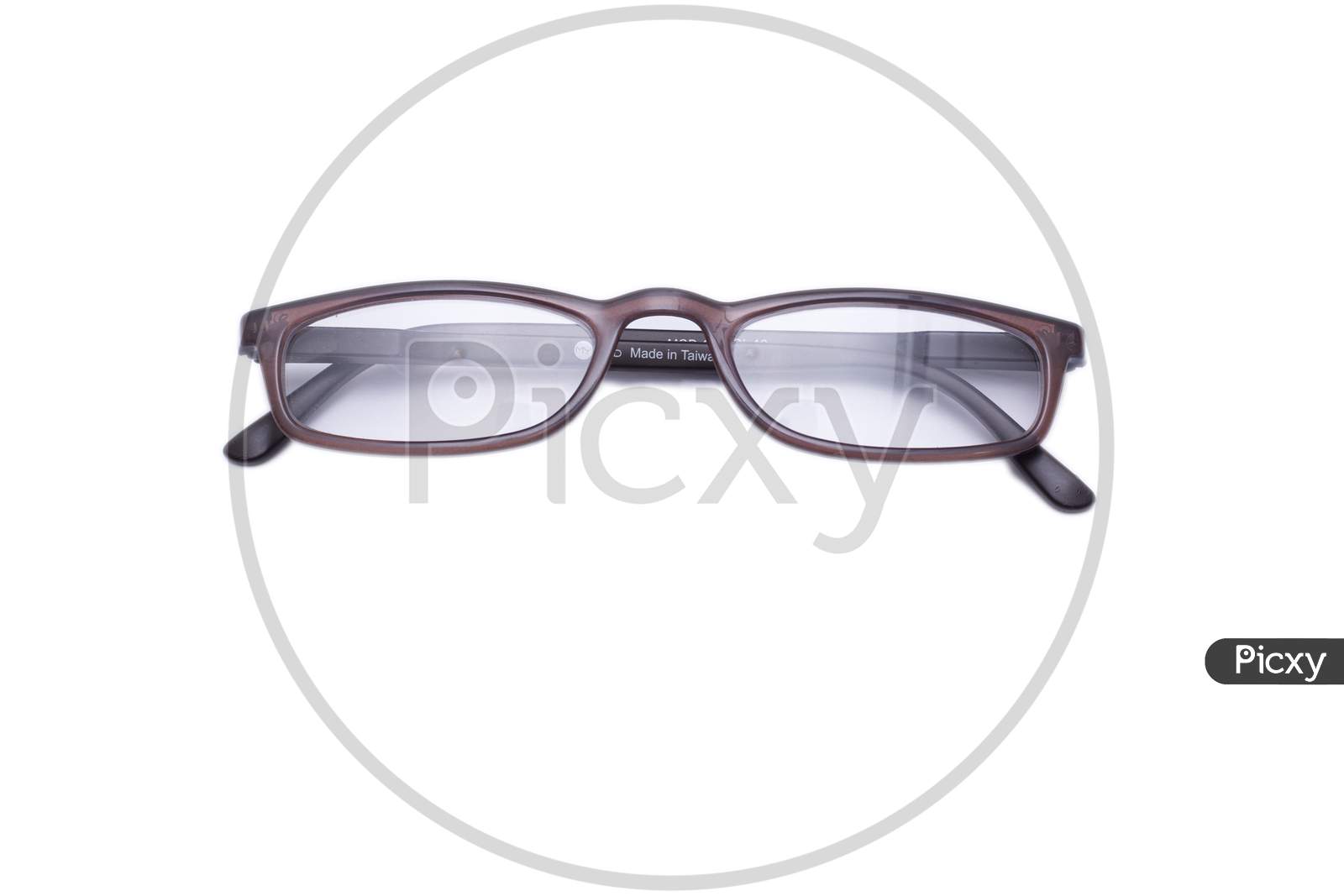 Top View Photo Of Reading Specs,Brown And Black Colour Gradient Frame.