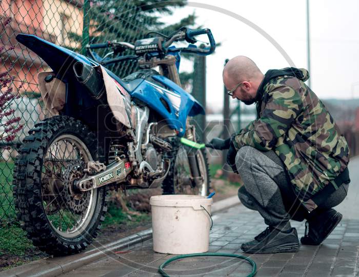 27 March 2020 Wroclaw - Motocross Yamaha WR 250r has been washed by young man.