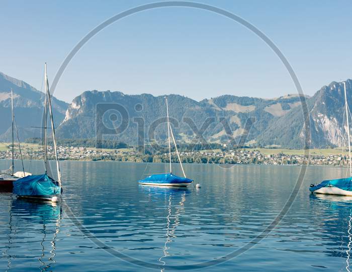 Lake With Yachts And Mountains Landscape