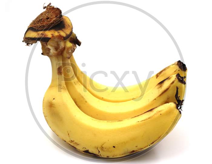 three banana side view on white background