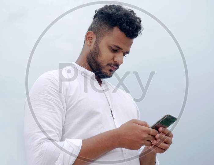 young man with a mobile phone