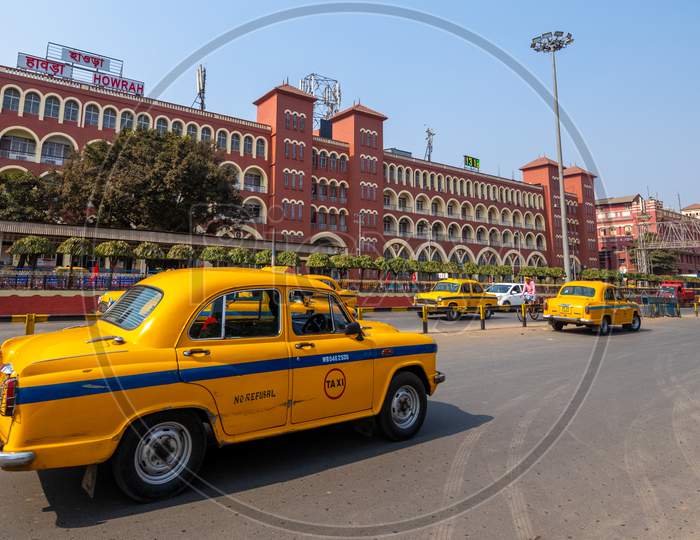 Yellow  Cab  Running On Howrah Railway Station  Background in Kolkata, West Bengal