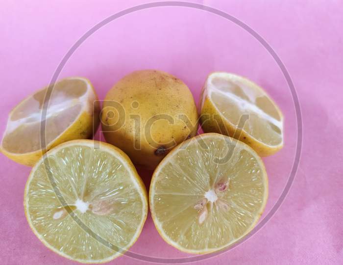 Whole lemon with half.