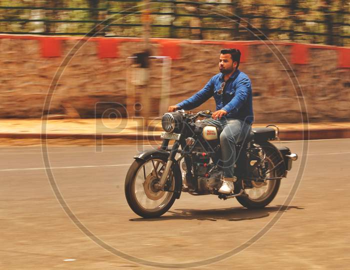 Delhi, India - 17 February 2019: Riding On A Bullet (Blurred Motion).