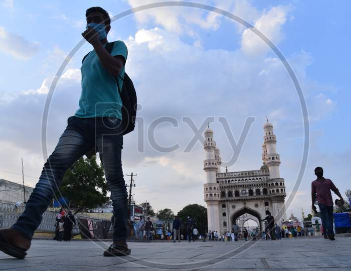 A man with a face mask walks past Charminar during the ongoing Lockdown amid Coronavirus Pandemic.  Charminar, Hyderabad, May 30, 2020.