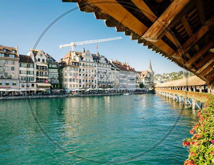 Wooden Footbridge And Old Town Of City Lucerne