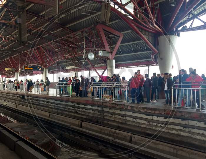 Delhi, India - March 29, 2019: People Wait For Metro Train In Kashmiri Gate Station. Delhi