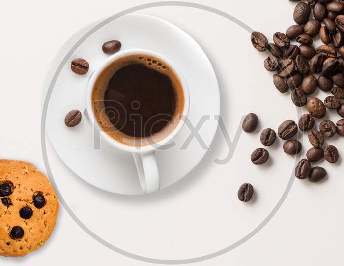 Cookie and cup of coffee.
