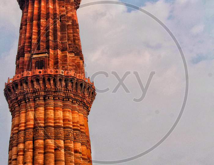 Delhi, India - 7 March 2019, Qutub Minar, A Minaret That Forms Part Of The Qutab Complex, A Unesco World Heritage Site In The Mehrauli Area Of Delhi
