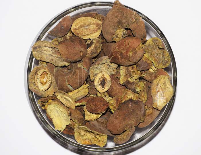 Baheda,Tropical Almond, Bibhitaki, Terminalia Bellirica, Bastard Myrobalan, Bahera In Southeast Asia Used As Traditional Ayurvedic Medicine. Dried Nuts Seeds Kernels