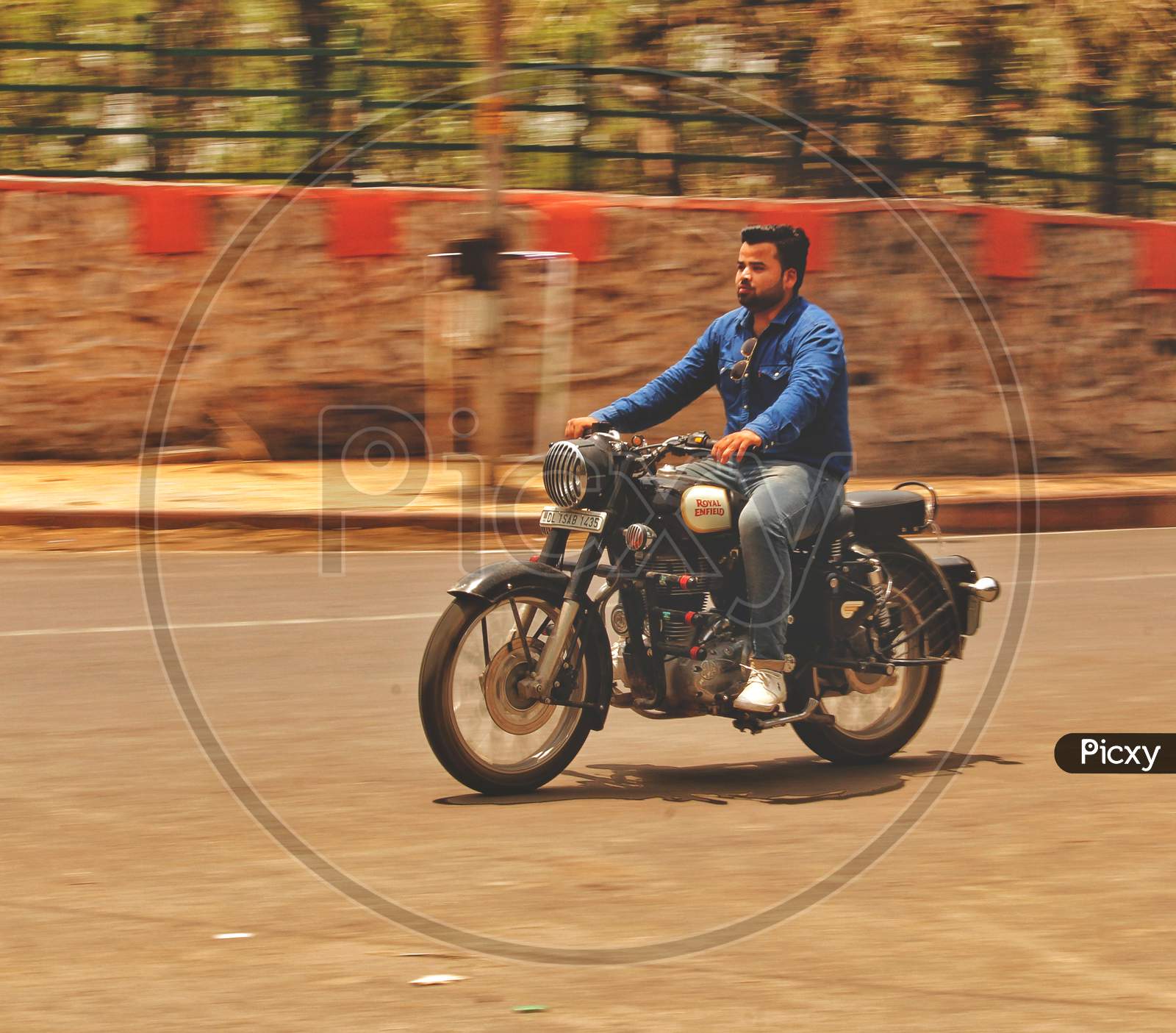 Delhi, India - 17 February 2019: Riding On A Bullet (Blurred Motion).