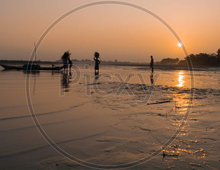 Sunset at the River Brahmaputra in Majuli Island, Assam.