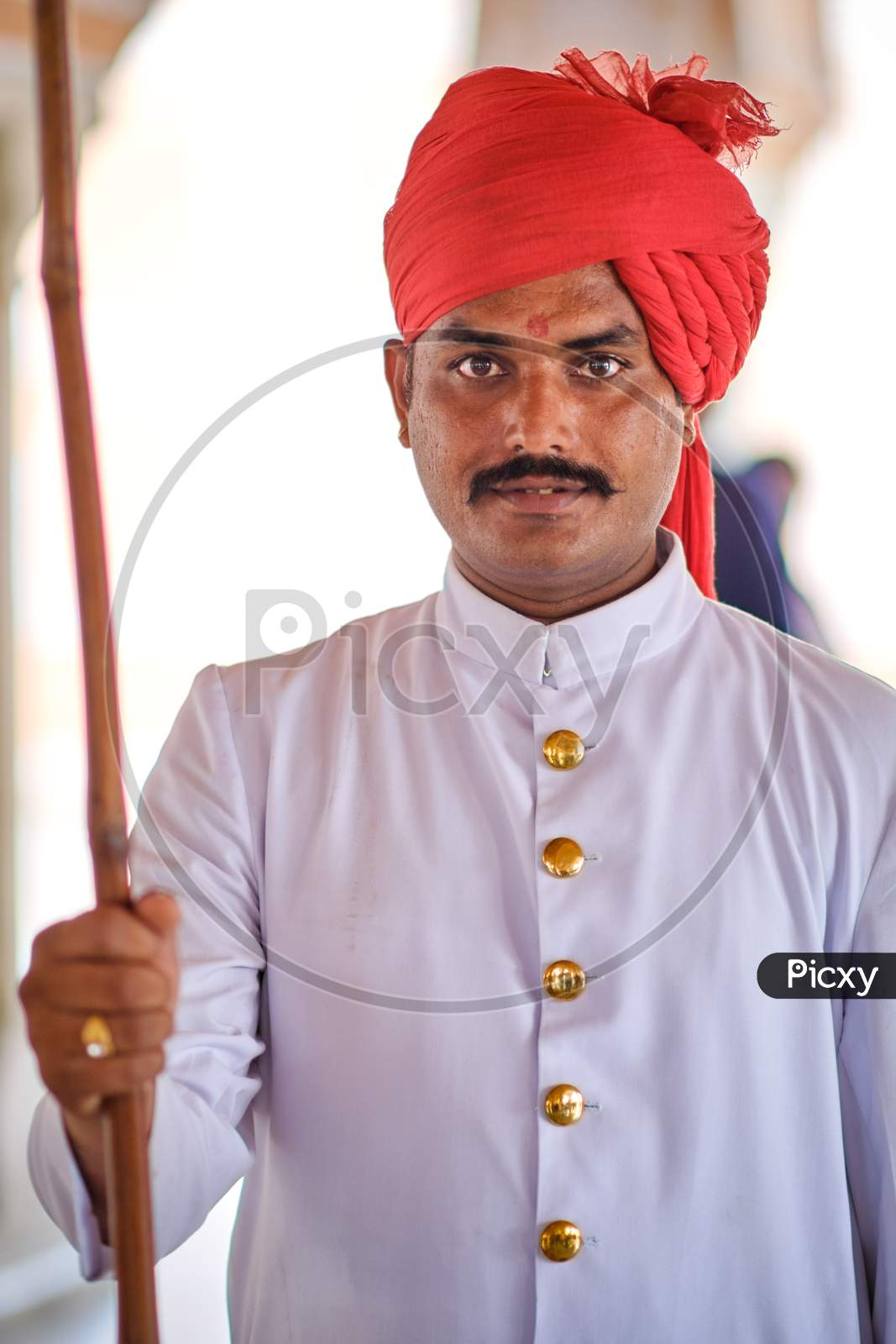 Portrait Of A Young Indian Man In Traditional Rajasthani Clothes Wearing Turban Safa Hat, Jaipur, India