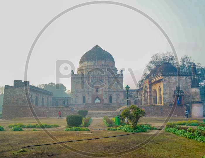 Lodi Gardens or Lodhi Gardens is a city park situated in New Delhi, India. Spread over 90 acres, it contains, Mohammed Shah's Tomb, Tomb of Sikandar Lodi, Shisha Gumbad and Bara Gumbad,