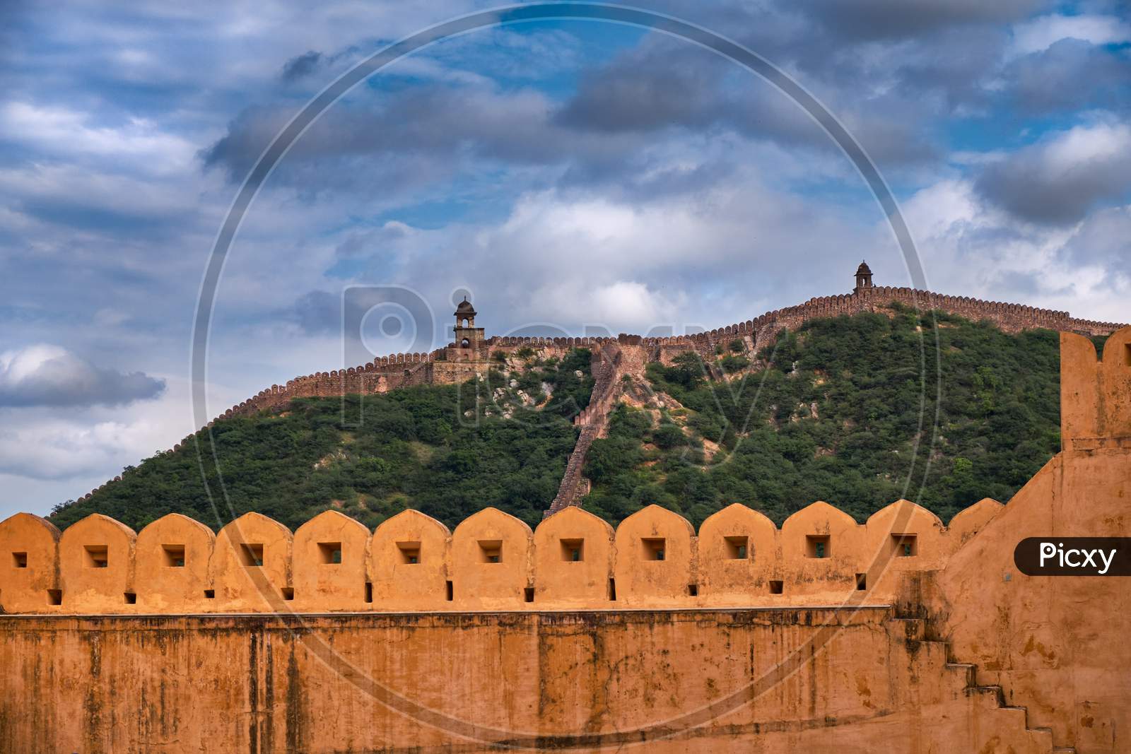 Walls Of Amer Fort With Jaigarh Fort In The Background, In Jaipur, Rajasthan, India