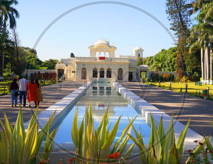 Water fountains, trees and colorful marigold flowers at Pinjore Gardens Haryana