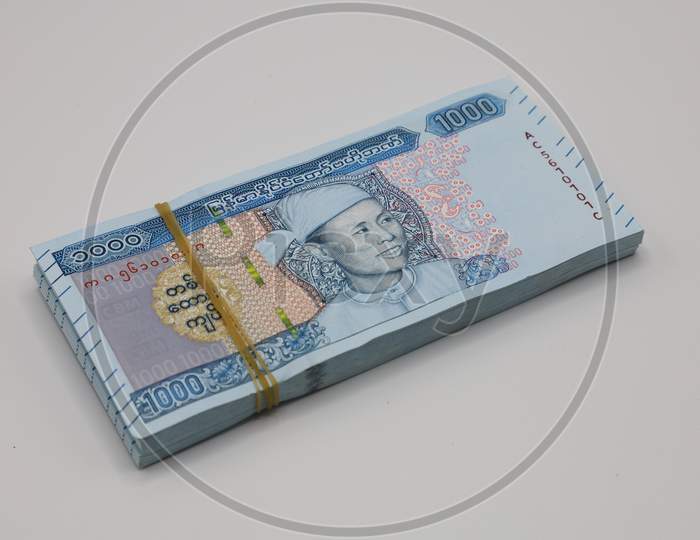 A Bundle of Myanmar Kyat Currency Notes isolated with White Background