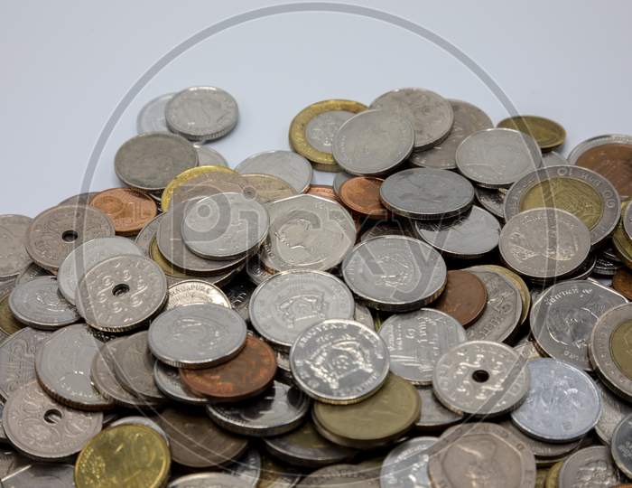 Currency Coins on White Background