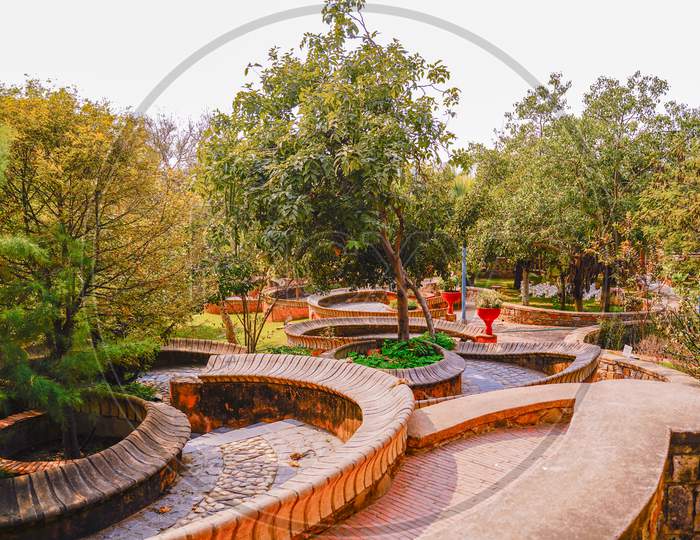 The Garden of Five Senses is a park in Delhi, India. Spread over 20 acres, the park is located in Saidul Ajaib village, opposite Saket, near the Mehrauli heritage area.