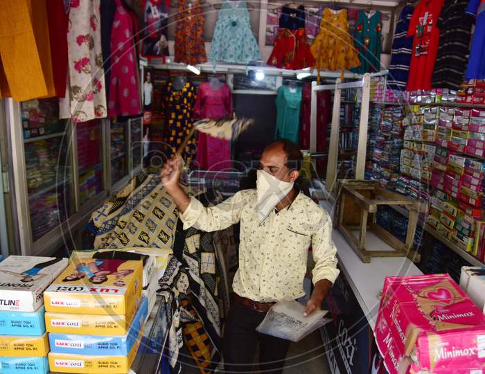 Nagaon : Shopkeepeer Claen Their Garment Shop   After Authorities Allowed Sale   With Certain Restrictions, During The Ongoing Covid-19 Nationwide Lockdown In Nagaon District Of Assam On May 04,2020 .Pix By Anuwar Hazarika