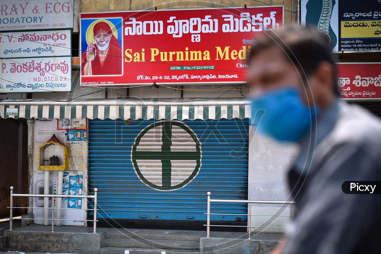 A Closed Medical Store Is Seen During The Nationwide Lockdown Imposed In The Wake Of Coronavirus Pandemic, In Vijayawada.