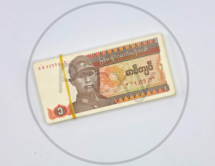 A Bundle of Myanmar Kyats Banknote, Myanmar Kyat Currency Notes isolated with White Background
