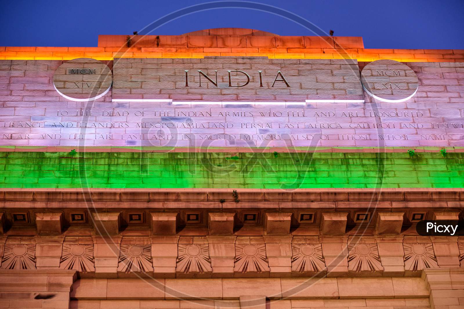 India Gate War Memorial In New Delhi, India, Illuminated In Colors Of Indian National Flag