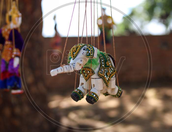 Selective Focus on Hanging Toy with Blur Background