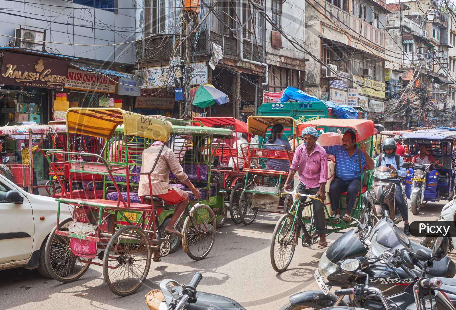 Traffic Congestion In Chandni Chowk, A Busy Shopping Area In Old Delhi With Bazaars And Colorful Narrow Streets
