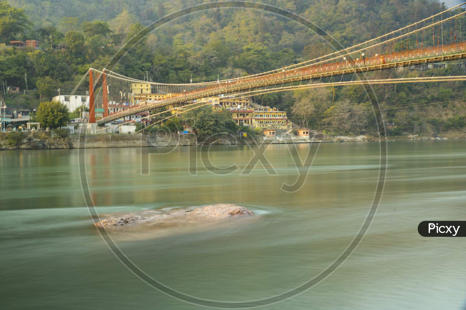 Ram Jhula and Laxman Jhula is an iron suspension bridge across the river Ganges,