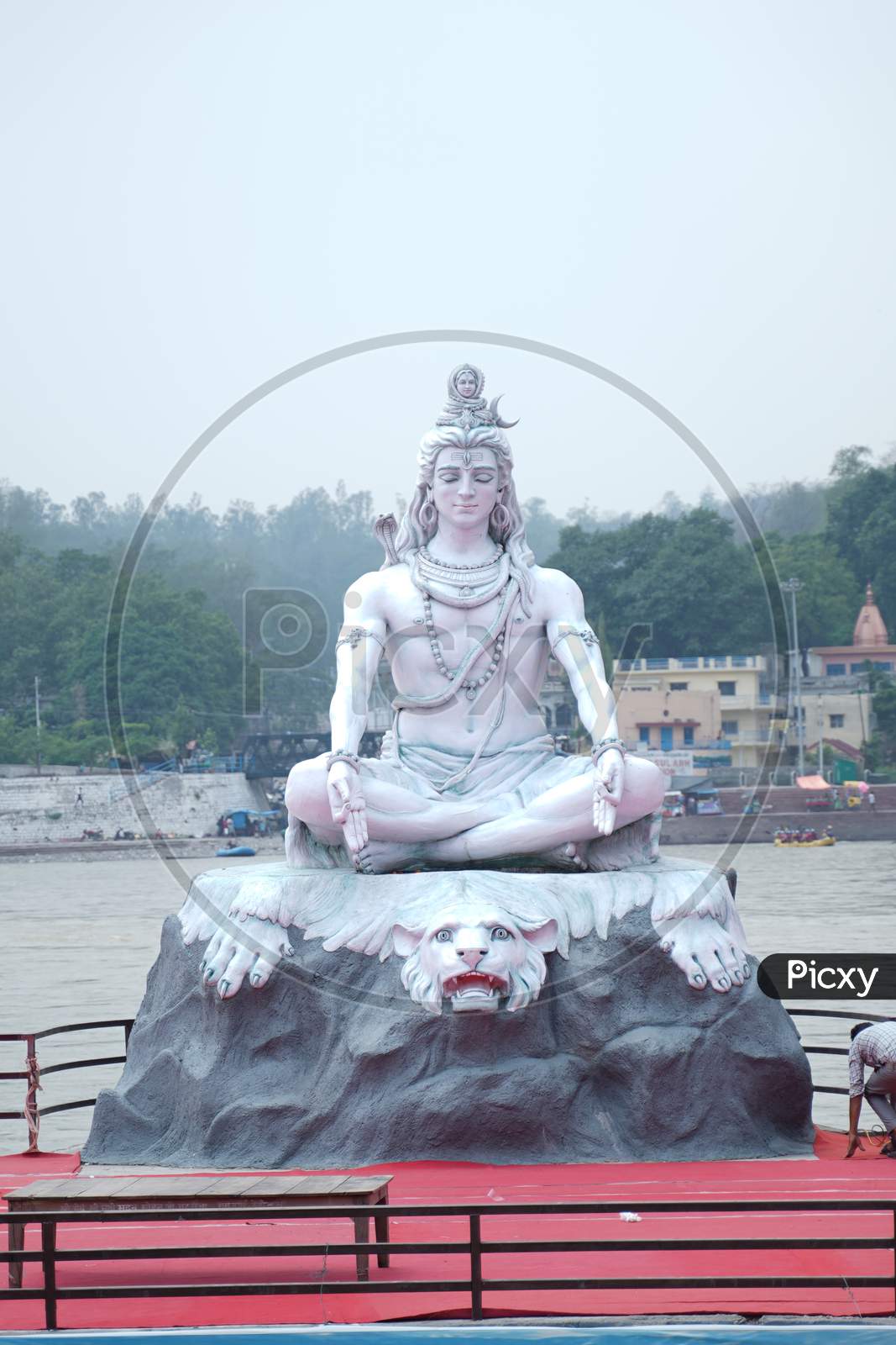 Statue Shiva, hindu idol on the river Ganges