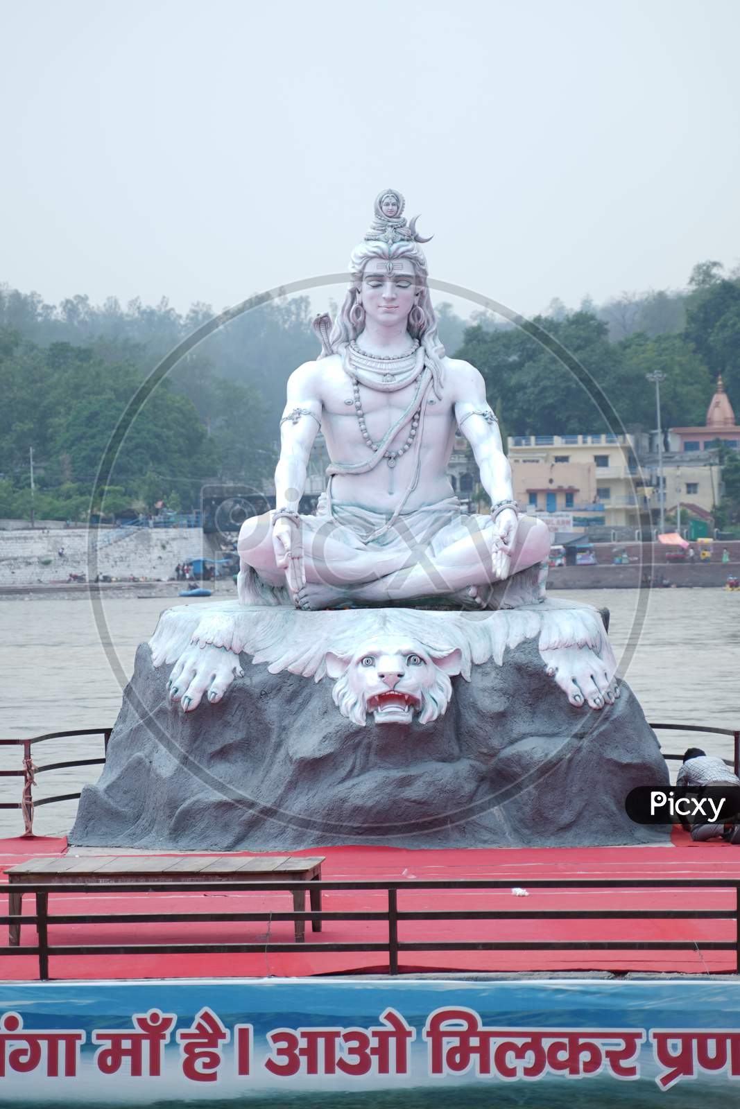 Statue Shiva, hindu idol on the river Ganges