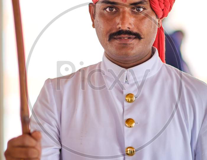 Portrait Of A Young Indian Man In Traditional Rajasthani Clothes Wearing Turban Safa Hat, Jaipur, India