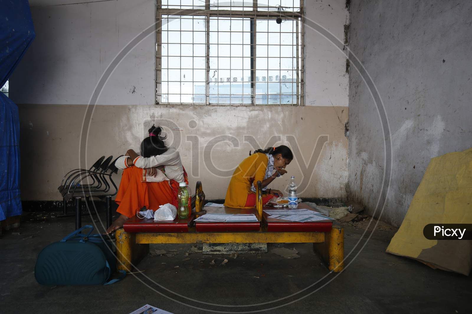 A woman eats a meal during the nationwide lockdown to stop the spread of Coronavirus (COVID-19) in Bangalore, India, May 02, 2020.