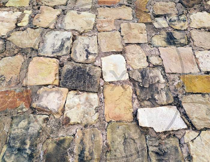 Detail of a stone wall with different size of rocks