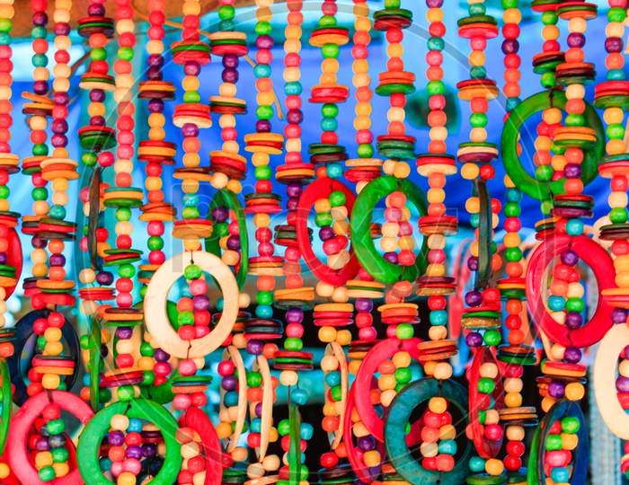 curtain made of colorful wooden beads and rings