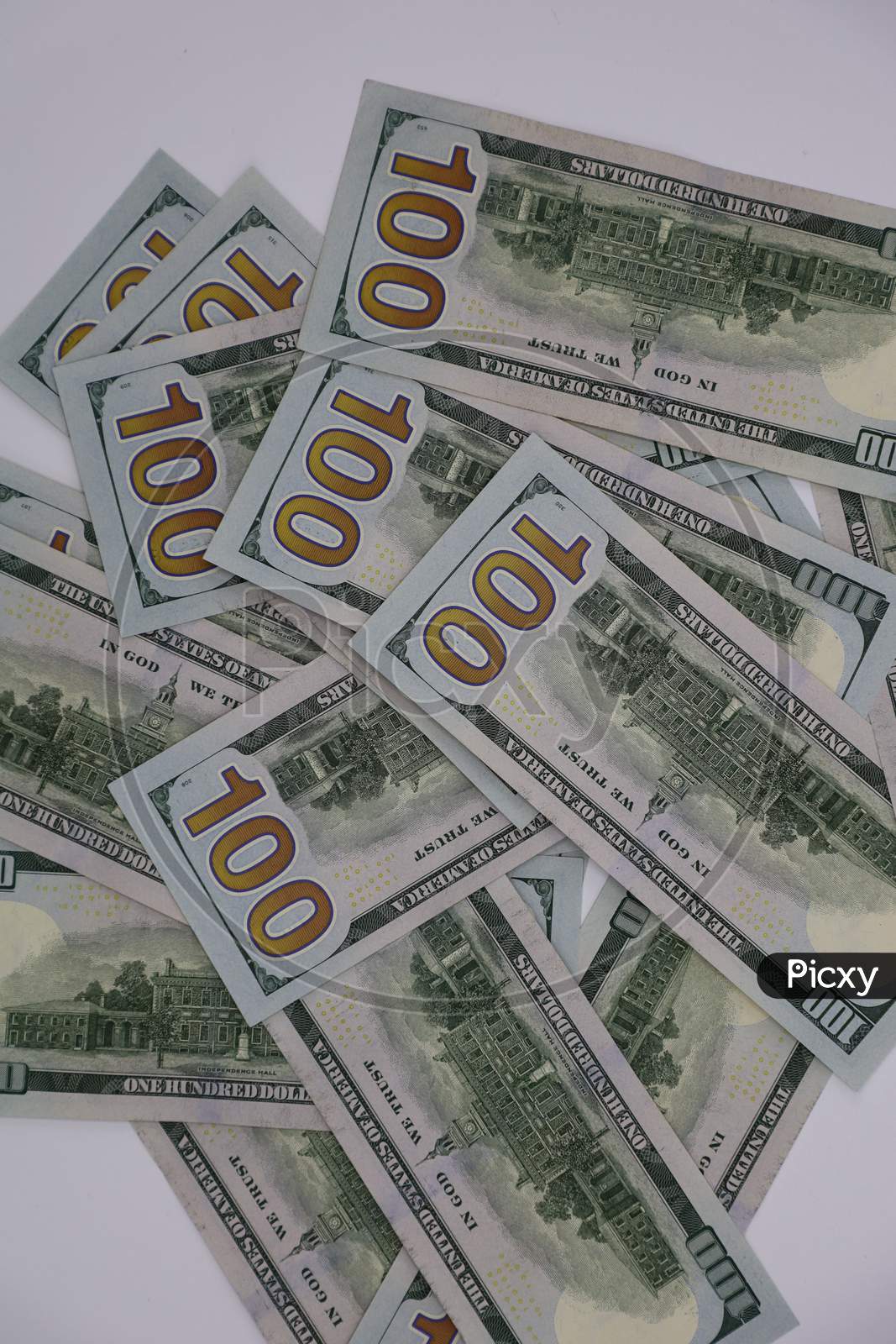 Stack of one hundred dollar bills close-up.
