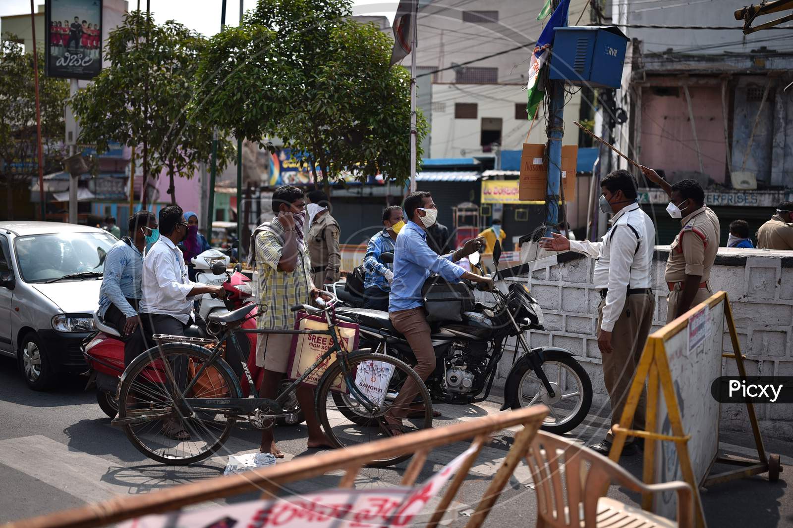 Police Personnel Divert The Commuters During The Nationwide Lockdown Imposed In The Wake Of Coronavirus Pandemic, In Vijayawada.