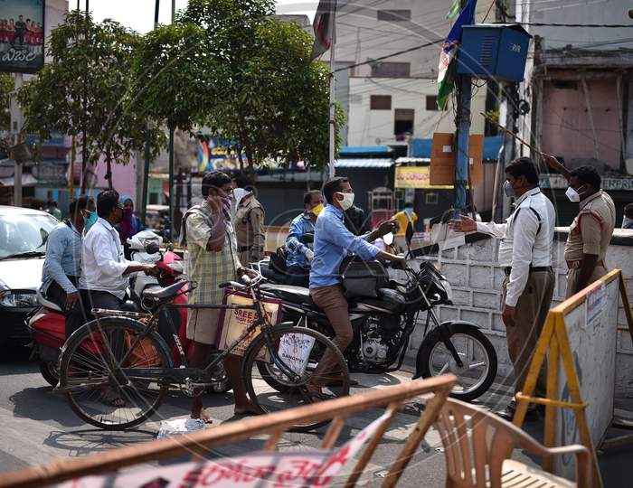 Police Personnel Divert The Commuters During The Nationwide Lockdown Imposed In The Wake Of Coronavirus Pandemic, In Vijayawada.