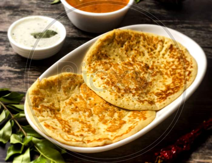 South Indian snacks DOSA in pair served with curry