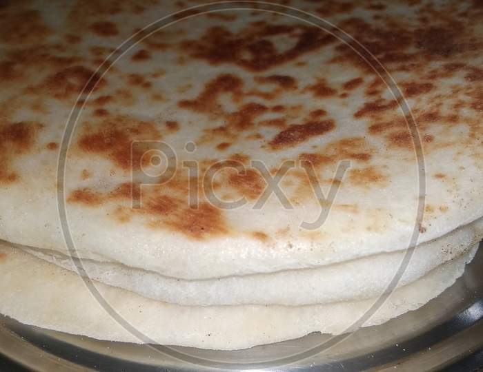 Bazlama tortilla ingredient backed naan roti dish. Selective focus