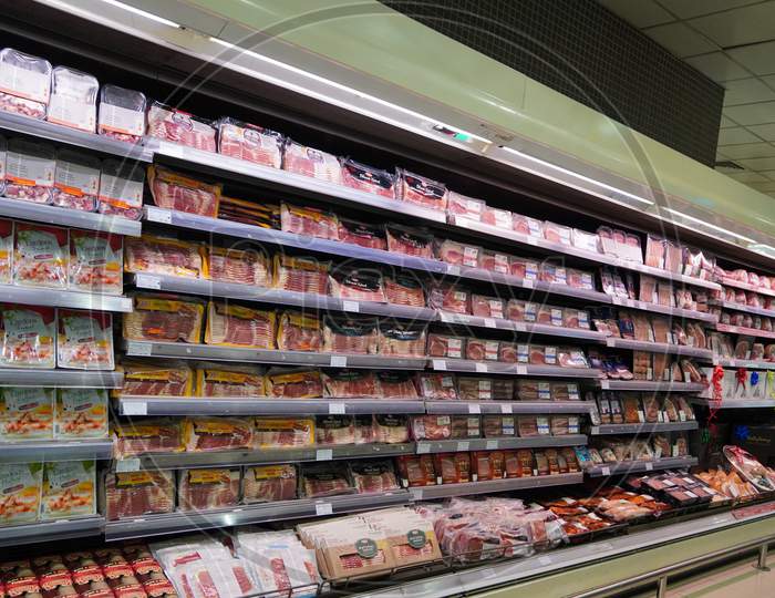 Meat, Supermarket, Butcher. Packets Of Meat At The Supermarket. Meat Aisle In Supermarket. Packaged Meats In Supermarket Refrigerated Section. Bacon, Turkey, Chicken, Steak- India