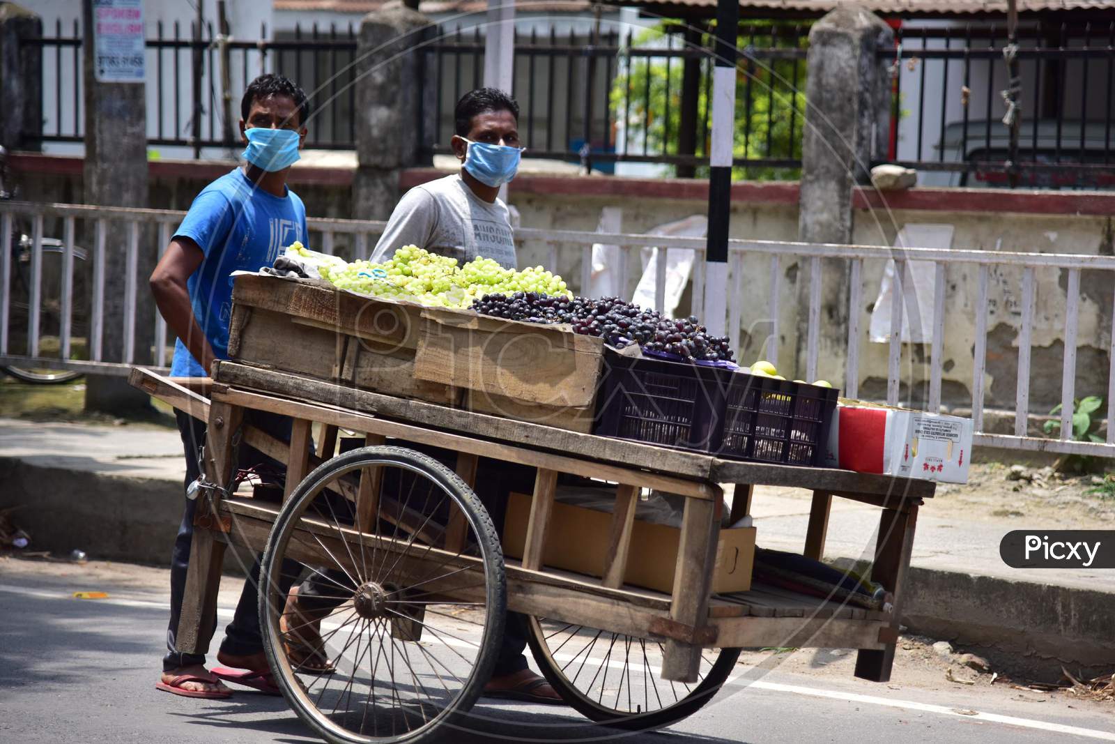 Nagaon :Vendor Carry Friuts On  His Cart  After Authorities Allowed Sale   With Certain Restrictions, During The Ongoing Covid-19 Nationwide Lockdown In Nagaon District Of Assam On May 04,2020 ..Pix By Anuwar Hazarika