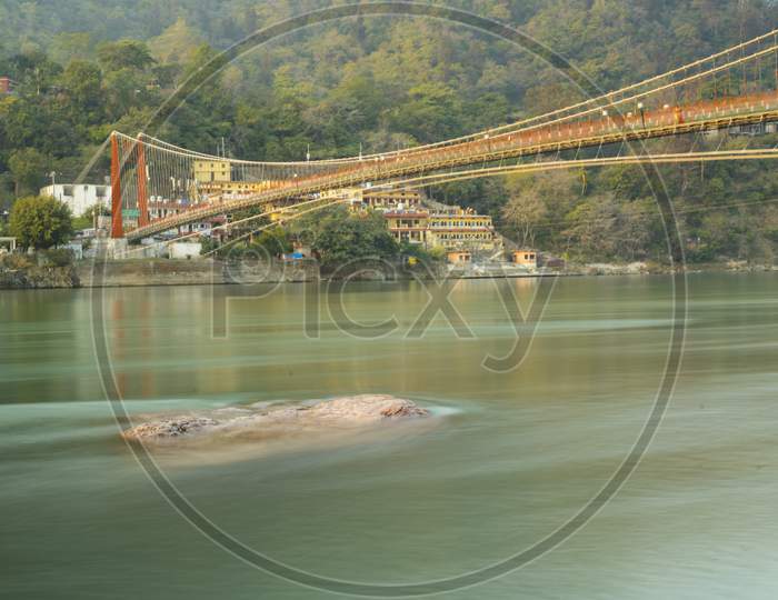 Ram Jhula and Laxman Jhula is an iron suspension bridge across the river Ganges,
