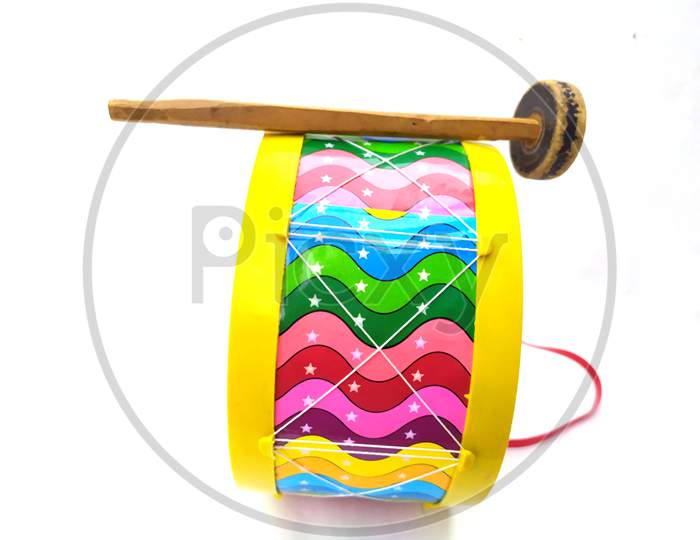 colorful children playing plastic drum isolated on white background