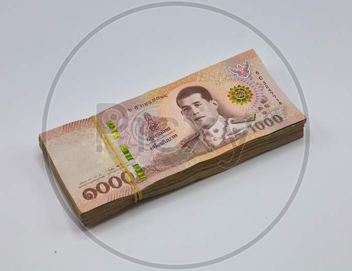 A Bundle of Myanmar Kyats Banknote, Myanmar Kyat Currency Notes on White Background