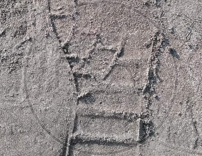 Shoe foot print in sand