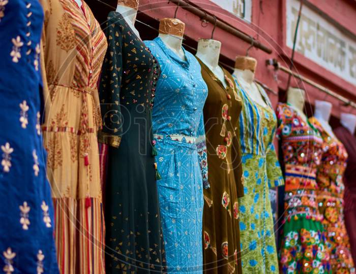 Indian Female Dresses At Bapu Bazar In Jaipur, Rajasthan, India, One Of The Most Famous Markets Of The City For Buying Traditional Sarees, Dresses And Other Indian Textile
